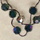 Montana and black diamond Swarovski crystals knotted on silk thread, 16